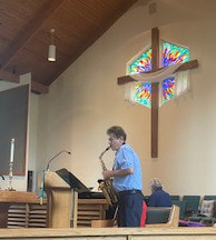 Instrumentalists playing sax at service